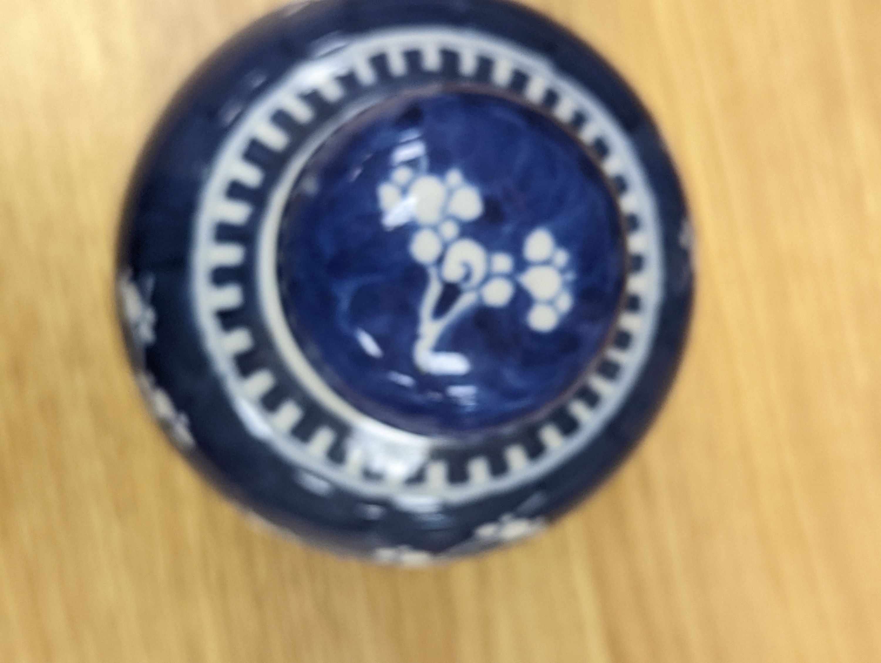 Three Chinese blue and white prunus decorated jars and covers, 19th/20th century, with four character marks 18cm